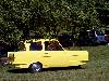 a yellow Triumph car